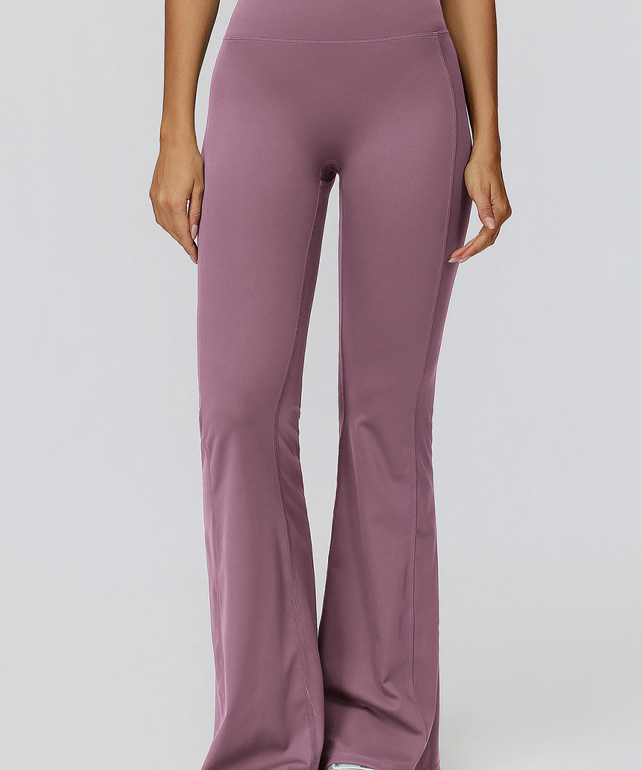 Pantaloni a vita alta svasati e arricciati