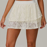 Gonna sportiva in pizzo trasparente