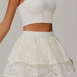 Gonna sportiva in pizzo trasparente